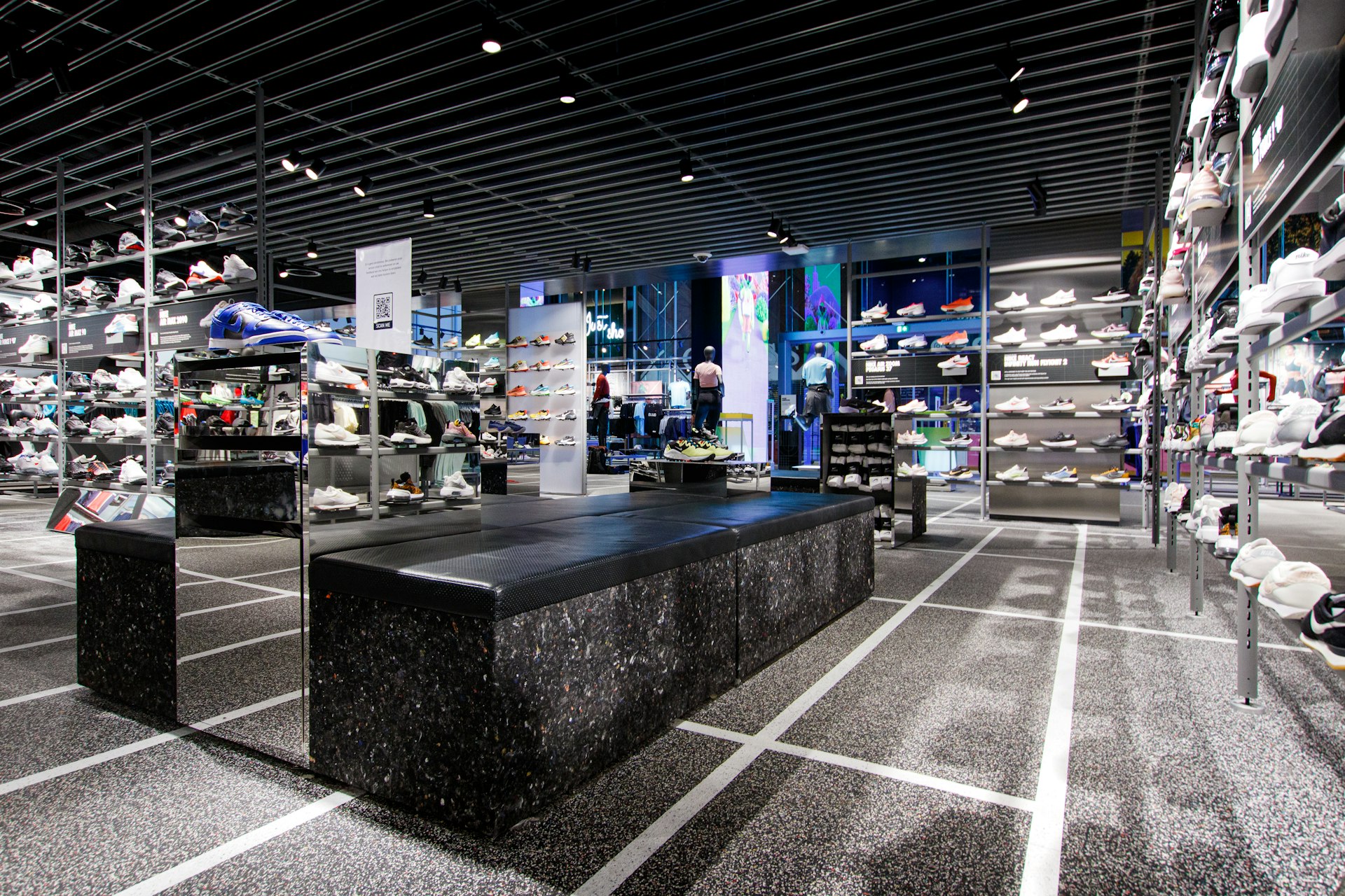 a store filled with lots of shoes on display